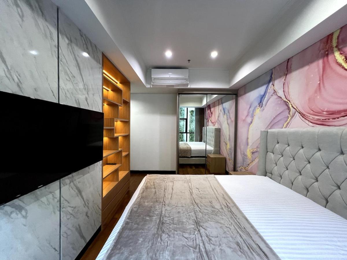 Apartemen 2 Bed Casa Grande Mall Kota Kasablanka, View Swimming Pool By Travelibu Jakarta